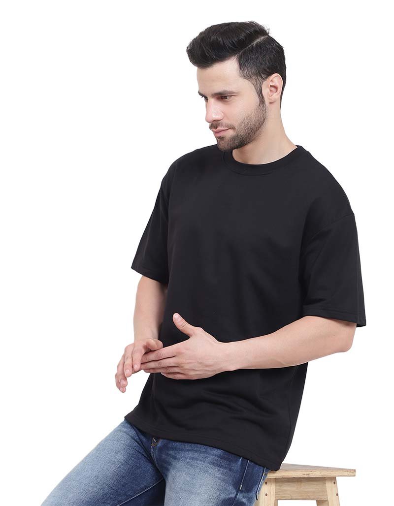 Black branded cotton oversize t-shirt styled with jeans - premium urban fashion comfortable fit